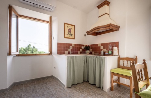 Poderetto Apartment | Apartment "La Sosta del Pellegrino" with Mountain View, Private Garden & Wi-Fi