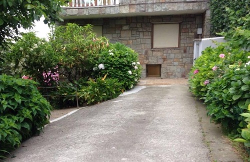 San Roman de la Llanilla Apartment | Apartment loft in chalet for 9 people garden barbecue playground beach