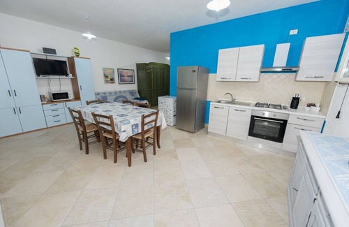 Orosei Apartment | Apartment "Mariposa" with Mountain View, Shared Terrace & Wi-Fi