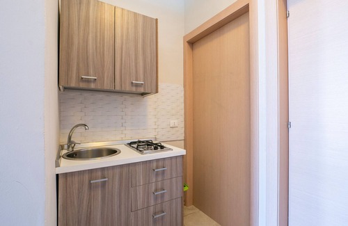 Porto Cesareo Apartment | Apartment 'Monolocale Petraroli Esterno' with Shared Garden, Balcony and Air Conditioning