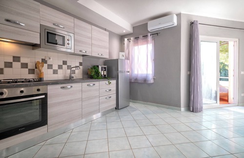 Canneddi Apartment | Apartment 'Nature Relax 113' with Sea View, Private Terrace and Air Conditioning