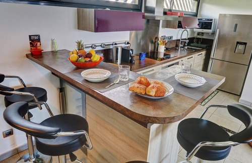 Sainte-Clotilde Condo | Apartment PANORAMIK with a view at 280° located in Saint-Denis