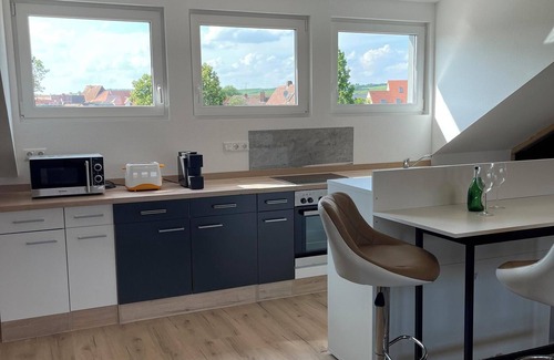 Volkach Apartment | Apartment Promedklinik 3 near Main River with with offer of wellness massages on site