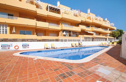Canada Apartment | Apartment 'Royal Cabanas Golf 88' with Shared Pool, Shared Garden and Air Conditioning