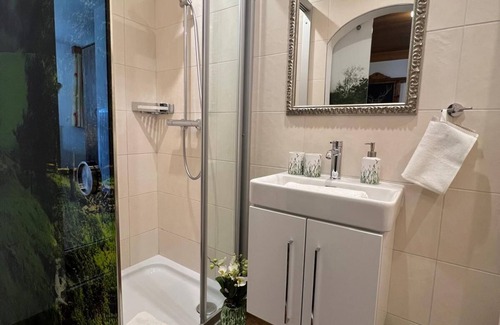 Sankt Johann im Pongau Apartment | Apartment 'Sonnentau' with Shared Pool, Shared Garden and Wi-Fi