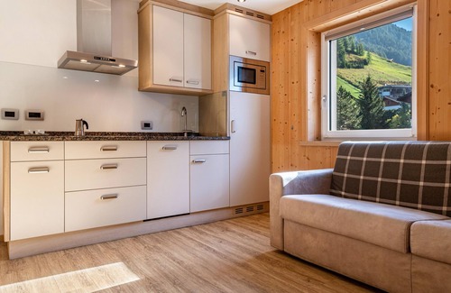 Selva di Val Gardena Apartment | Apartment "Stoffelapartments - Martina" with Mountain View, Shared Terrace & Wi-Fi