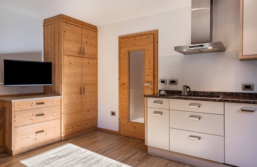 Selva di Val Gardena Apartment | Apartment "Stoffelapartments - Martina" with Mountain View, Shared Terrace & Wi-Fi