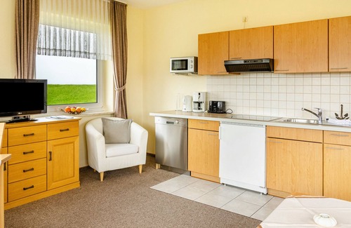 Baltrum Apartment | Apartment 'Strandhus Uiterst-hörn Treibholz' with Sea View, Shared Garden and Wi-Fi