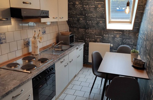 Dornumergrode Apartment | Apartment West - Guesthouse Zur alten Post