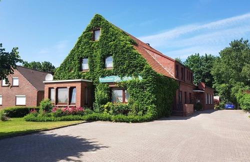 Dornumergrode Apartment | Apartment West - Guesthouse Zur alten Post