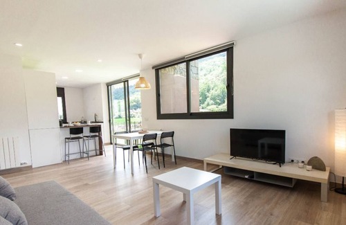 La Vall de Bianya Apartment | Apartment with large terrace and mountain views