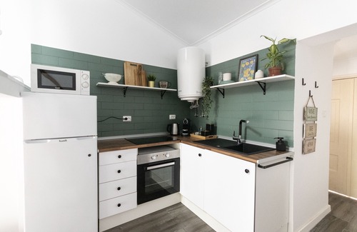 Merces Condo | Apartment with patio, in one of the city's eclectic areas.