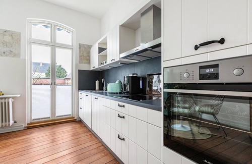 Garding Apartment | Apartment 'Wohnoase Im Denkmal' with Private Terrace, Balcony and Wi-Fi