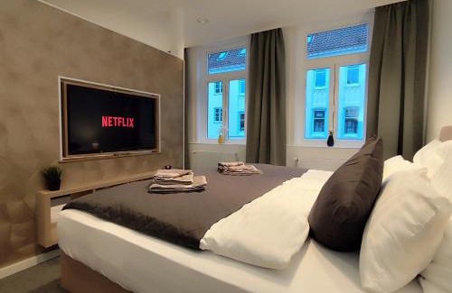 Celle Apartment | ApartZ - Celle Altstadt - bis 9 Personen, 3 SZ, Infrarotsauna, Parkplatz, W-LAN, Dachterrasse