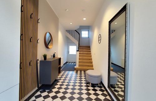 Celle Apartment | ApartZ - Celle Altstadt - bis 9 Personen, 3 SZ, Infrarotsauna, Parkplatz, W-LAN, Dachterrasse