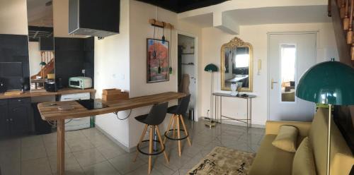 Sainte-Clotilde Centre Apartment | Appartement Flamboyant
