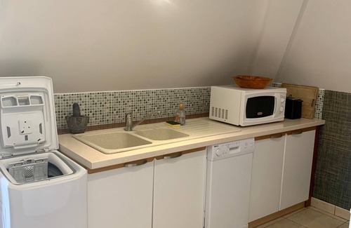 Piton Saint-Leu Apartment | Appartement le Guétali, T3 de 60m² à l'étage, 2 chambres. Vue jardin et mer