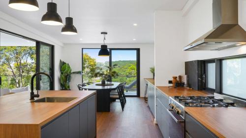 Horsfield Bay House | Aquilae-Waterfront Property Horsfield Bay -firepit,late check out