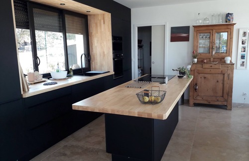 Mondragon House | Architect-designed house in a subdivision with views and a swimming pool not overlooked