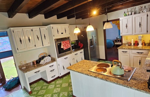 Fayetteville House | Artistic 70s house will make you feel nostalgic with all the modern comforts.