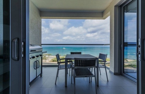 Noord Condo | Aruba Luxury Beach Oceanfront residence at Azure minutes to Eagle and Palm beach