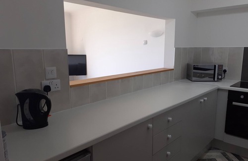 Dawlish Apartment | As close to the beach as you can possibly get ! uninterrupted estuary views