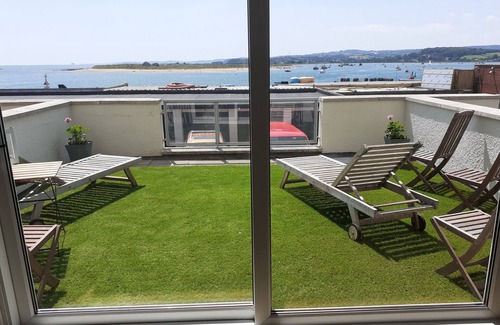Dawlish Apartment | As close to the beach as you can possibly get ! uninterrupted estuary views