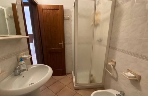 Capo d'Orso Apartment | At 250 m from the sea two-room apartment with veranda and garden