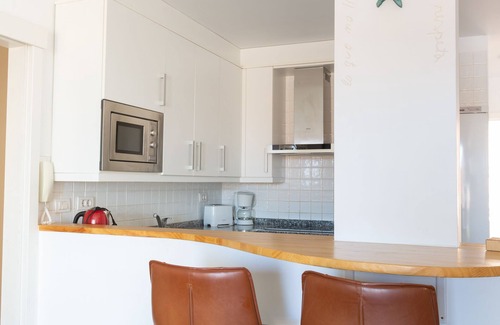 Poris de Abona Apartment | At sea level, and overlooking the beach. Apartment with terrace and 8 hrs of sun