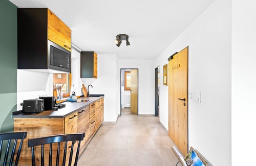Reit im Winkl Apartment | Atelier Walchsee | mountain view, pool & sauna