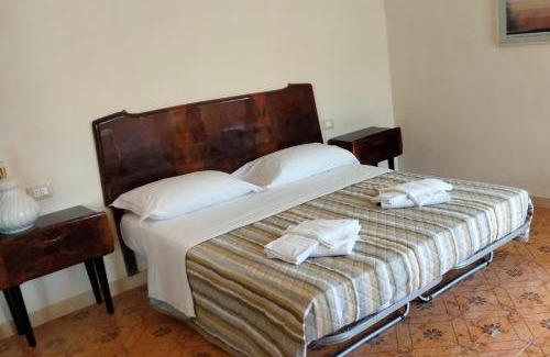 Corinaldo Hotel | ATTICO SULLA BOUGANVILLE (Albergo diffuso)