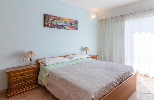 Arona Apartment | Attractive apartment on the first floor with private garden (table, chairs, deckchair and barbecue).