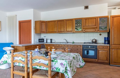 Arona Apartment | Attractive apartment on the first floor with private garden (table, chairs, deckchair and barbecue).