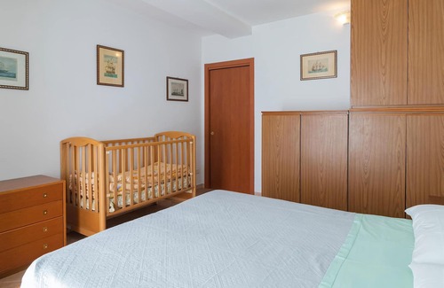 Arona Apartment | Attractive apartment on the first floor with private garden (table, chairs, deckchair and barbecue).