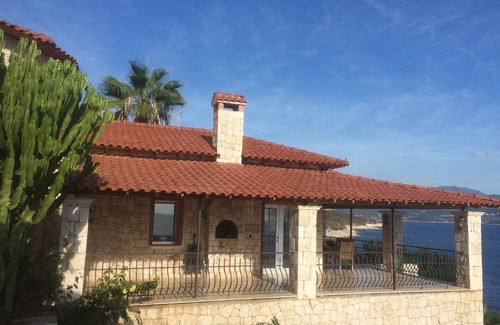 Kas Villa | Attractive villa with a large pool and private sea access - stunning view