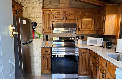 Front Royal Cabin | Authentic Mountain Log Cabin Perched On A Cliff Side Above The Shenandoah River