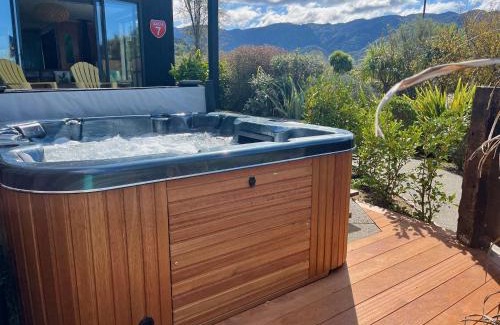 Marahau House | Bach 7 by The Sea - Spa Pool and Views