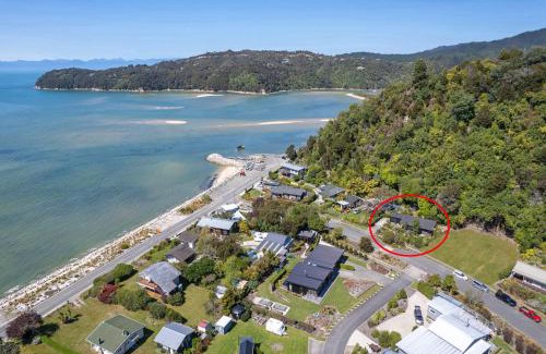 Marahau House | Bach 7 by The Sea - Spa Pool and Views