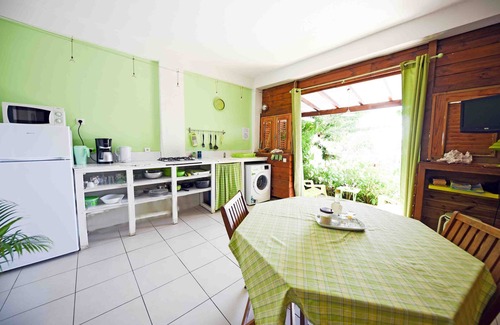Deshaies Apartment | Bamboo apartment in a postcard setting overlooking the Caribbean Sea
