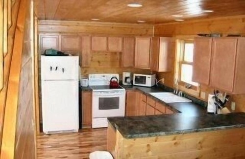 Land O Lakes Ski Chalet | Bargain fall/winter/spring rates. Lakefront privacy & campfire pit.