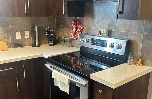 Airdrie House | Basement suite with full kitchen