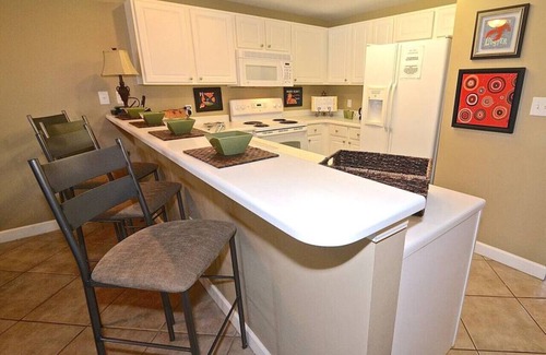 Gulf Shores Condo | Bay front- Bay John-boat slips-pier