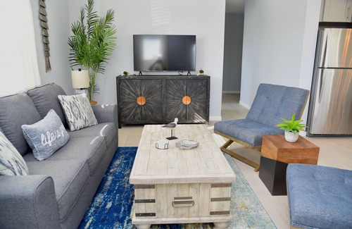 Long Neck House | Bay front retreat - beach, pools, pet friendly!