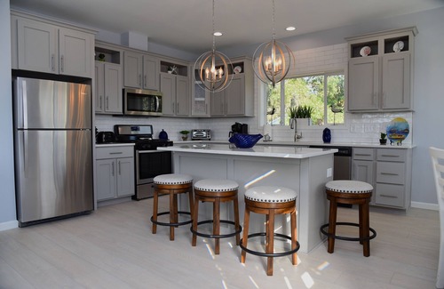 Long Neck House | Bay front retreat - beach, pools, pet friendly!