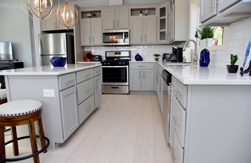 Long Neck House | Bay front retreat - beach, pools, pet friendly!