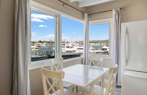 Balboa Peninsula House | Bayfront Condo w/Dock Access + Patio | Walk to Beach, Surf & Newport Dining
