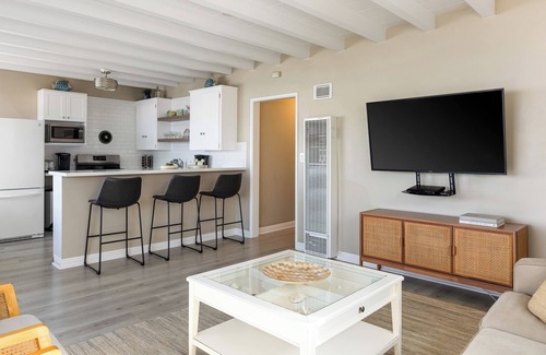 Balboa Peninsula House | Bayfront Condo w/Dock Access + Patio | Walk to Beach, Surf & Newport Dining