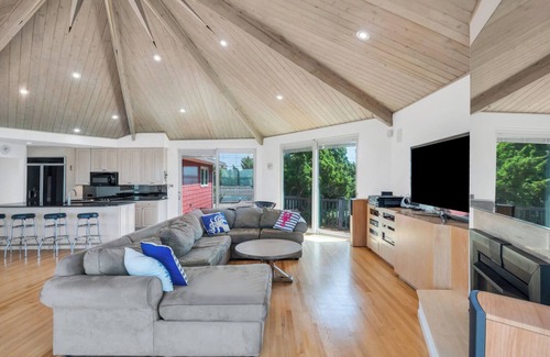 Westhampton Beach House | Bayfront home with private path across the street to ocean, pool and hot.