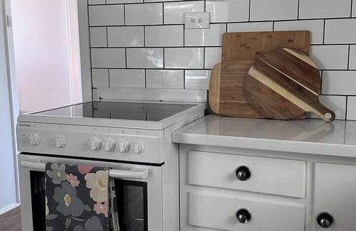Scotts Head House | Beach Bunker: Retro Charm steps to Scotts Beach