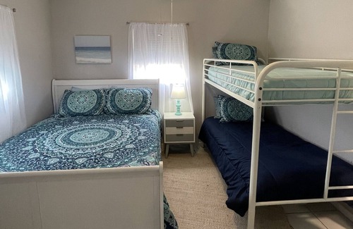 Crescent Beach Cottage | Beach cottage walking distance to the sugary white sand!